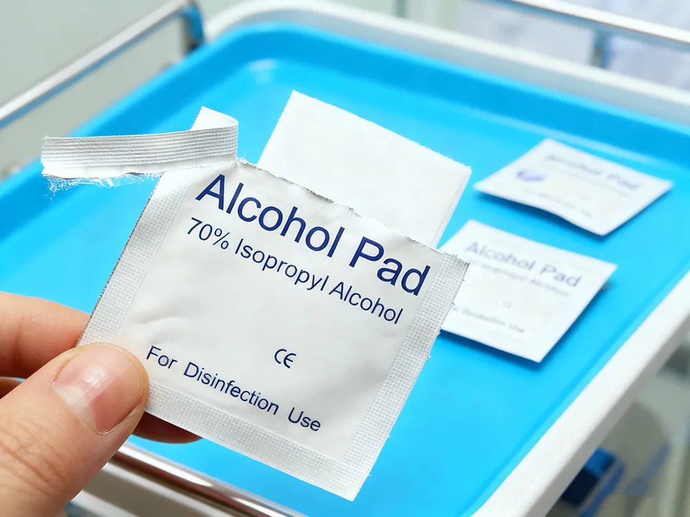 shevenmed alcohol pad foil packaging Close-up of Shevenmed alcohol prep pad in high-quality aluminum foil packaging, showing the airtight seal.